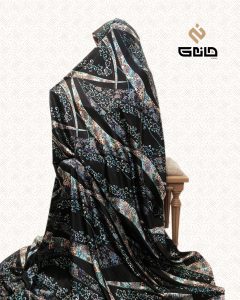 قواره پارچه چادری ژاکارد پشت کرپ زمینه مشکی با طرح‌های اسلیمی بافته شده برند مانکو